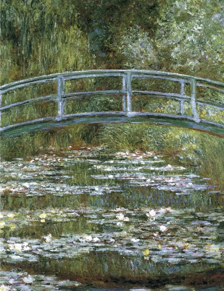 A pale green wooden footbridge arches across a pond crowded with white and pink water lilies, framed by dense green foliage — Claude Monet, Bridge over a Pond of Water Lilies, 1899